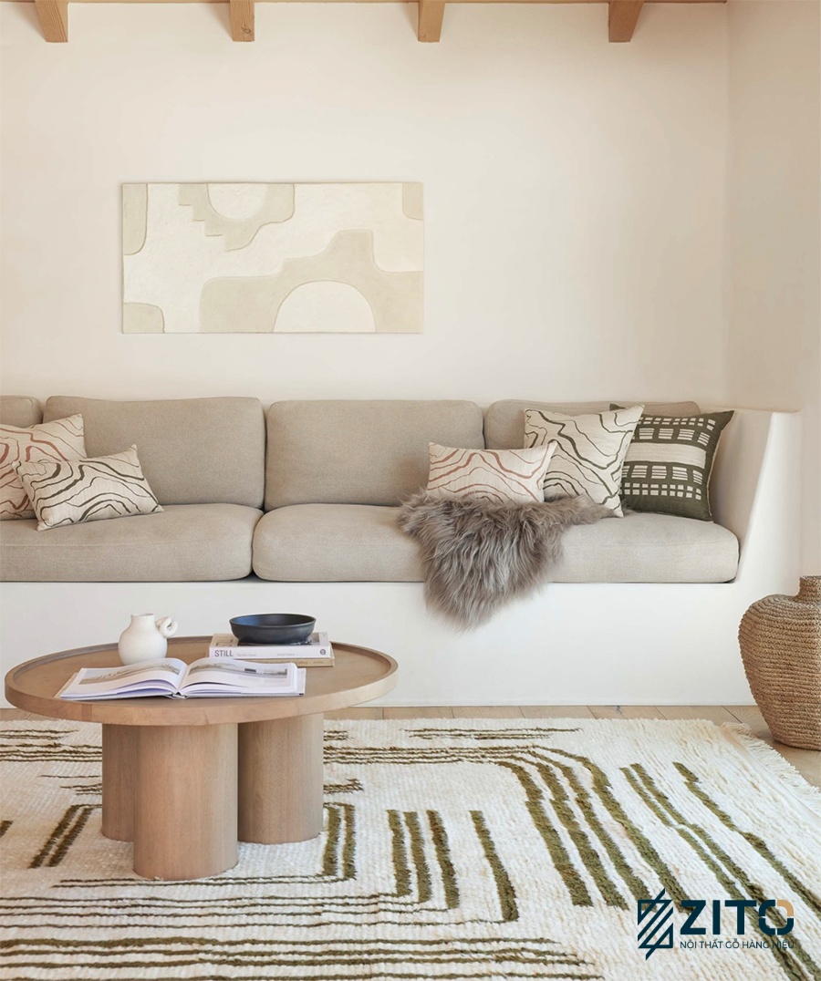 Điểm nhấn của căn phòng khách thiết kế hiện đại phong cách tối giản là bộ bàn ghế sofa