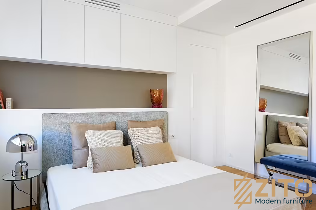 Không gian nội thất phòng ngủ theo lối hiện đại sử dụng tông màu trắng tinh khôi